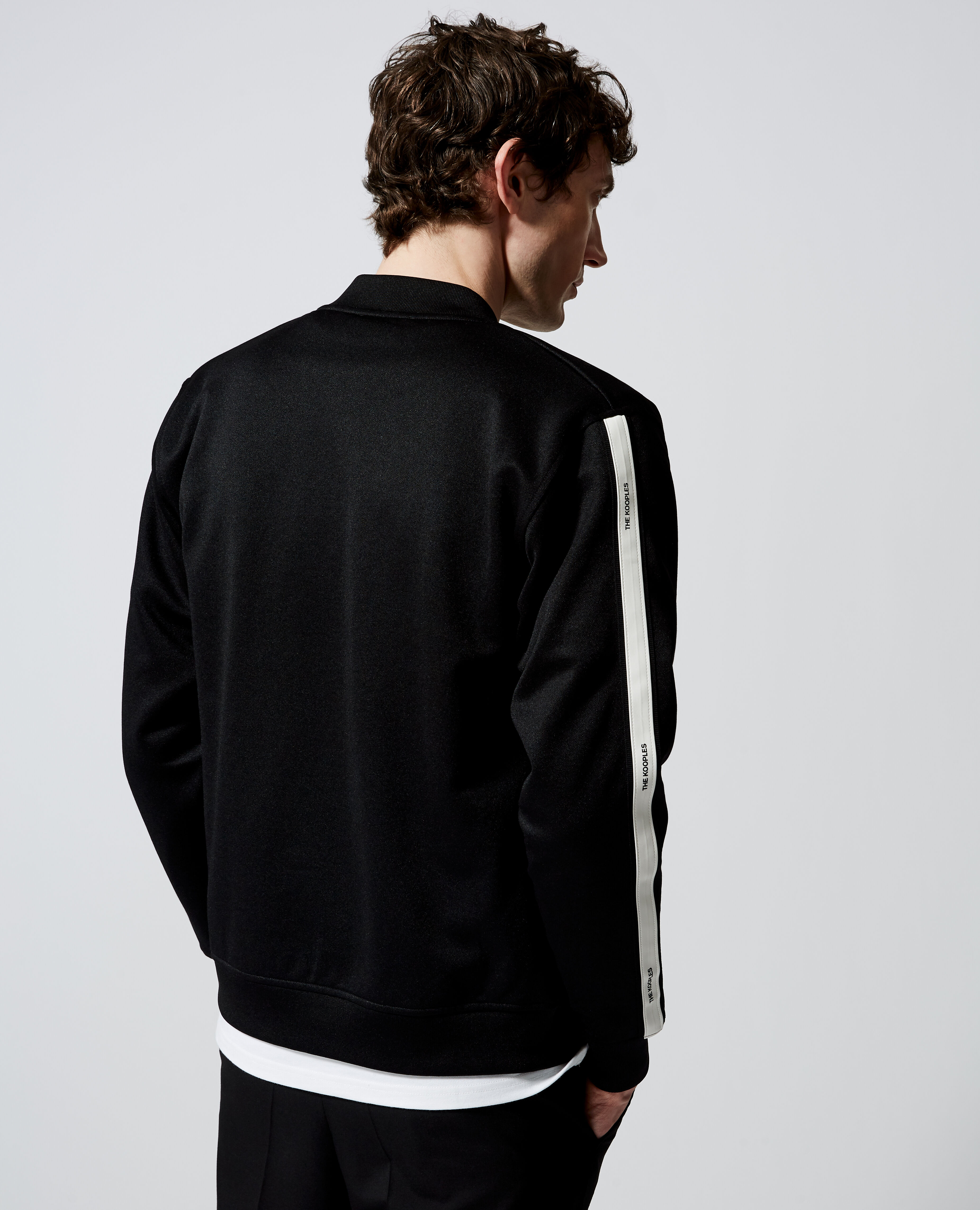 Sudadera negra cremallera bandas efecto piel blanca The Kooples