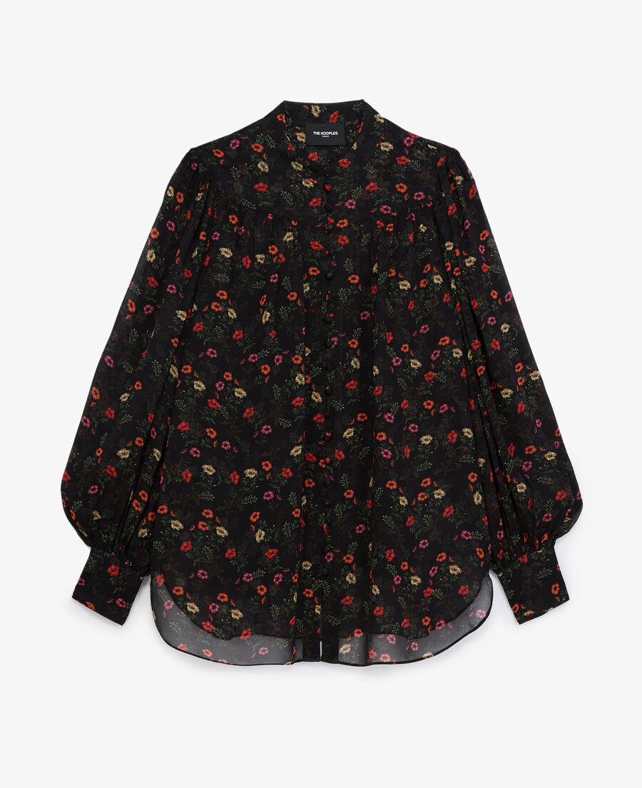 flowing buttoned black top with floral print
