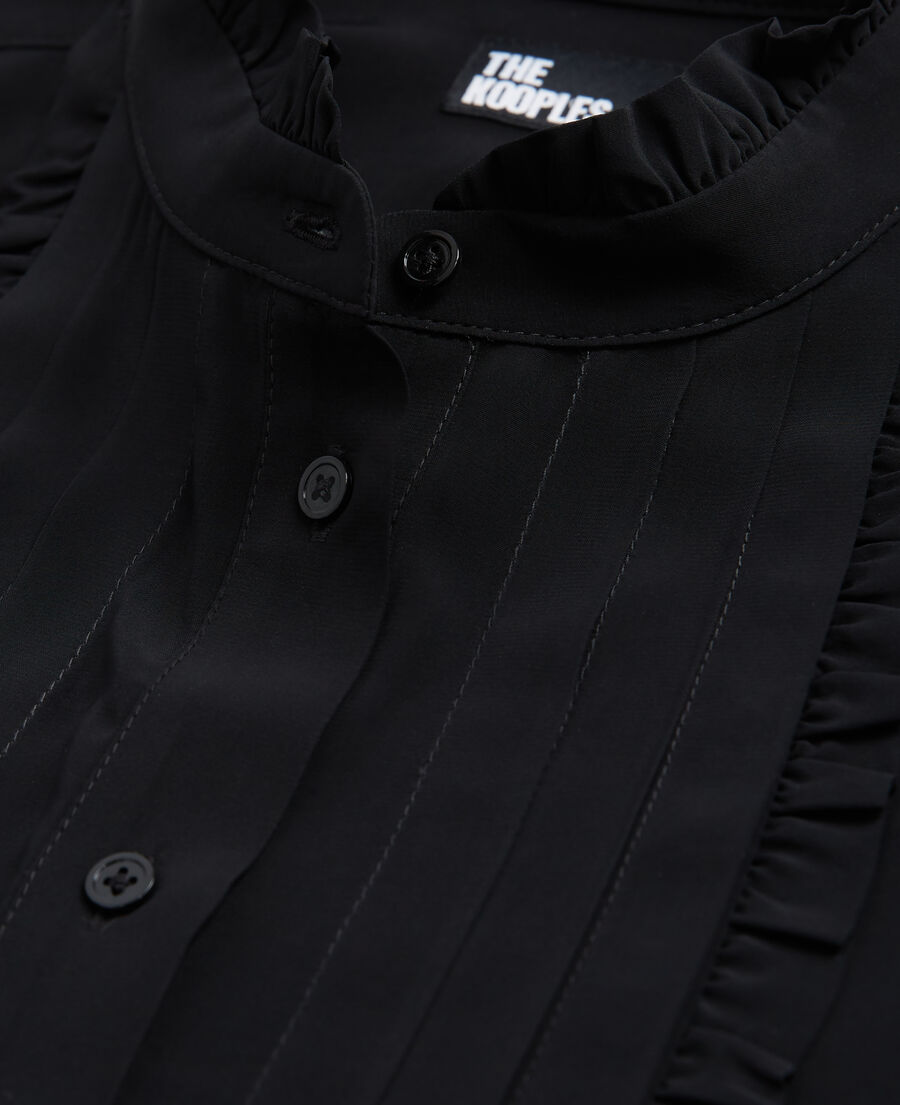 black flowing shirt