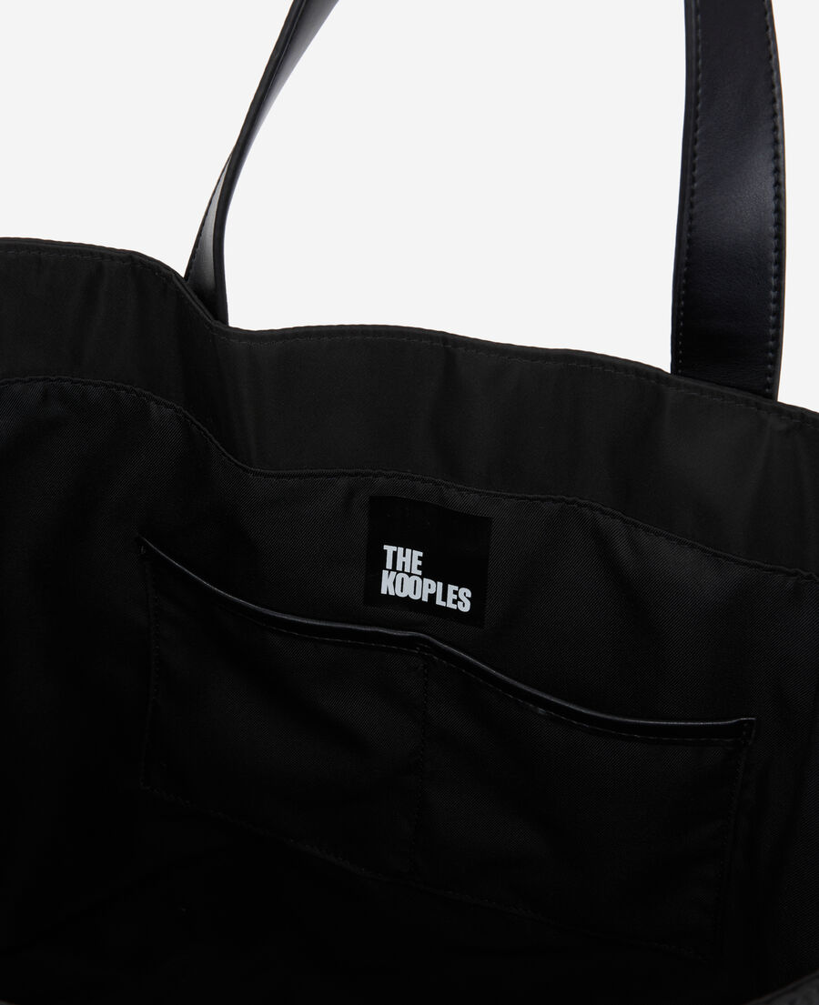 large black tote bag with tape logo