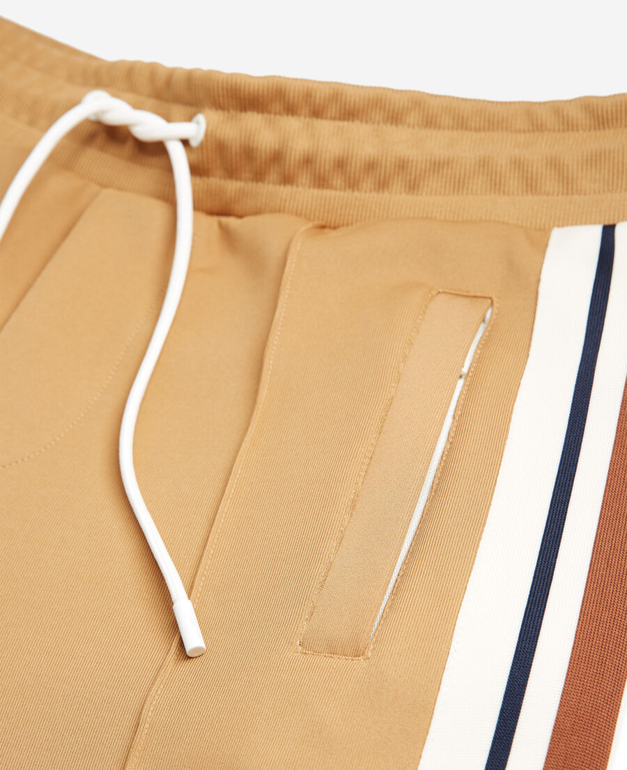 camel joggers with side zippers and stripes