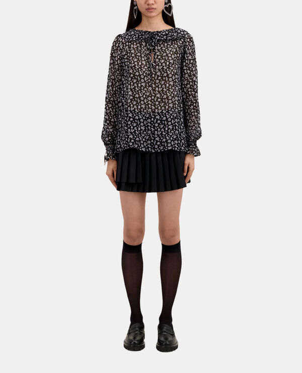 printed top with ruffles