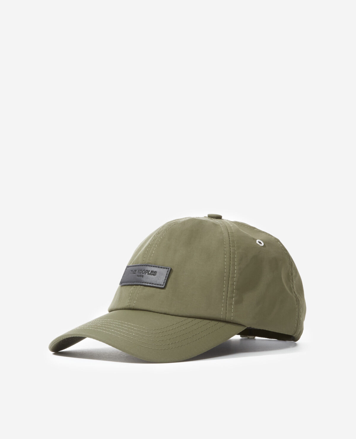 Khaki nylon cap with black leather badge The Kooples