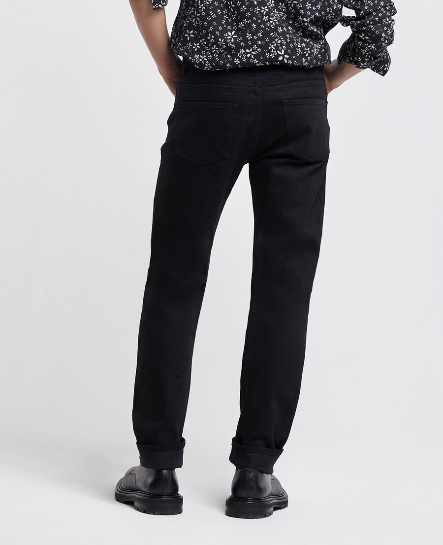 slim-fit black jeans with silver rivets