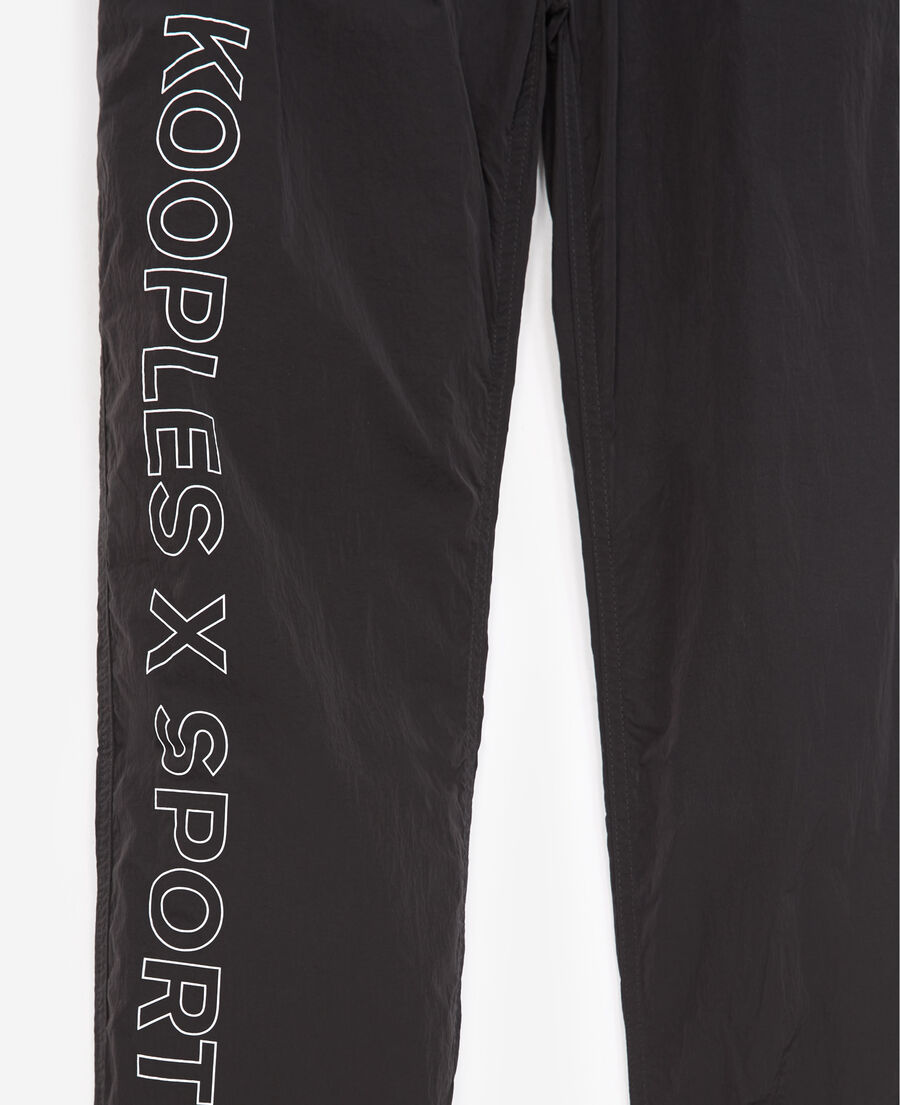 pantalon noir bandes logo latérales