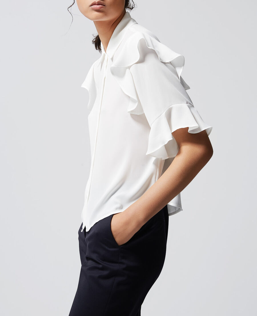 white shirt with pearly buttons