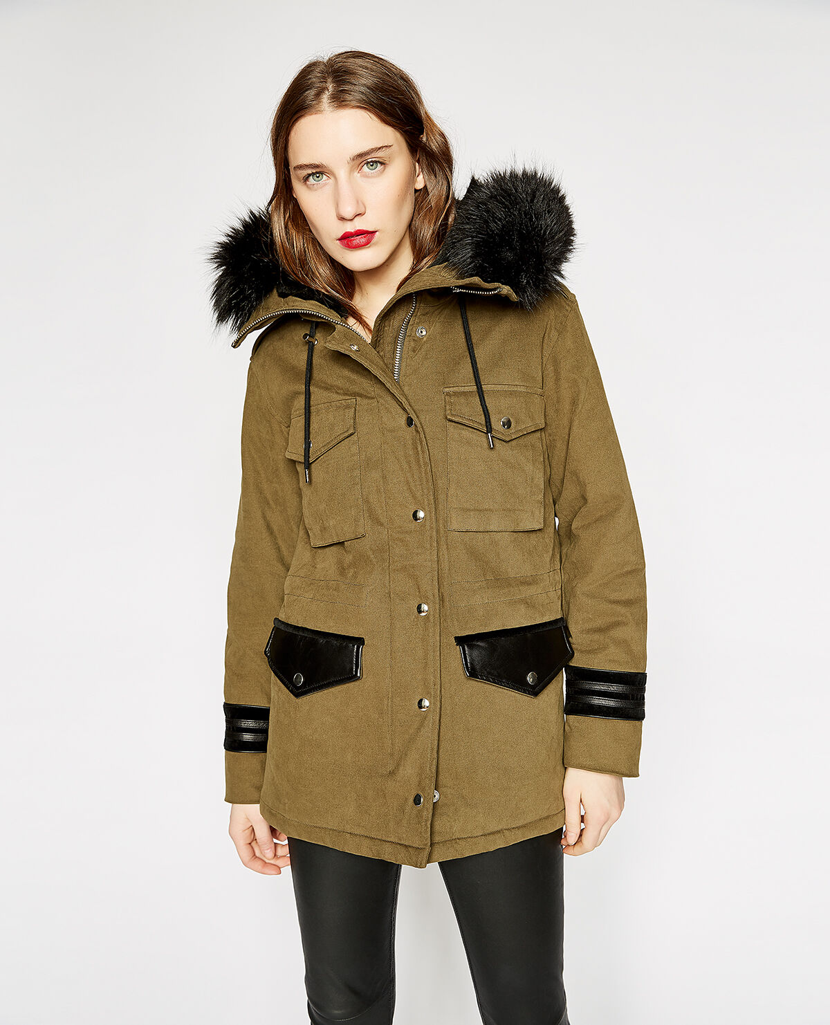 The kooples parka deals with fur hood