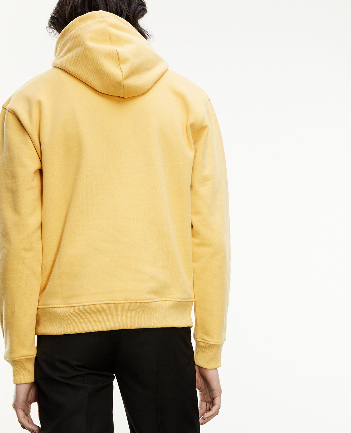 Yellow hoodie with embroidered flower