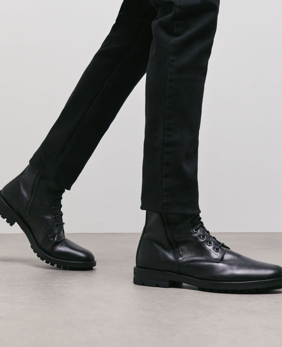 The Kooples black leather boots, this season's star piece! Discover our  selection of men's ready-to-wear on the website and in store.