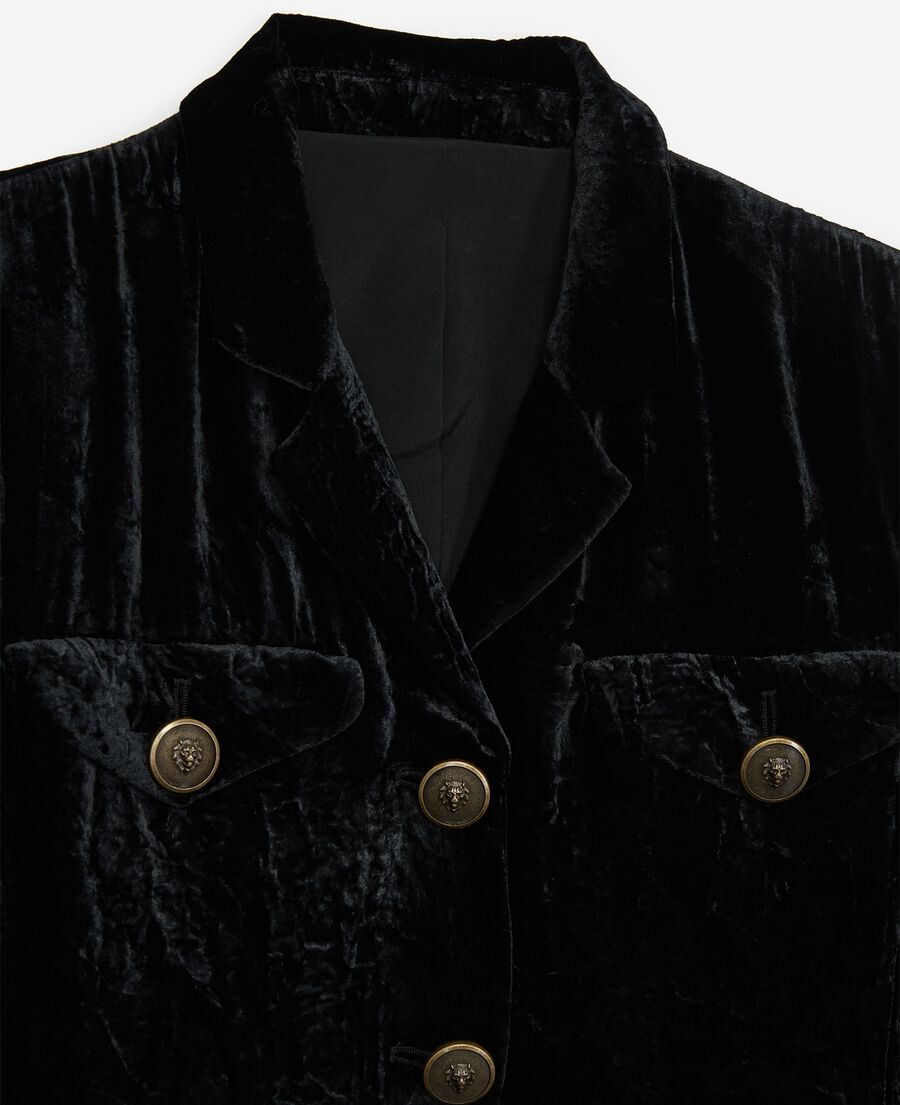 chaqueta negra de terciopelo aplastado y bolsillos de parche