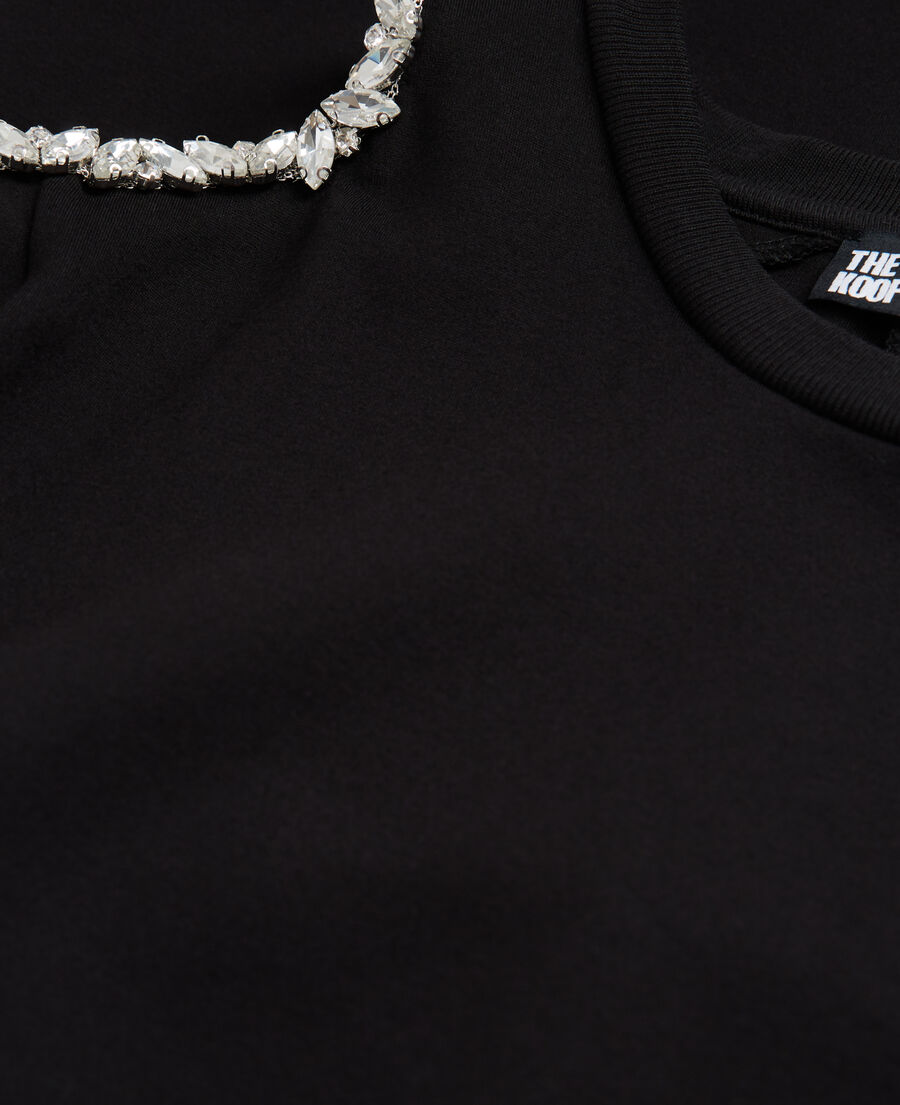 short black dress with shoulder details