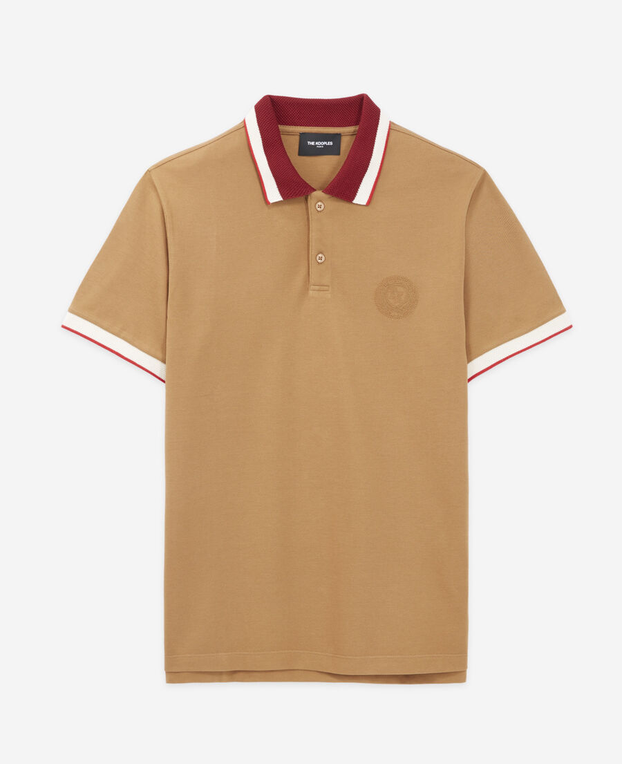 camel polo with burgundy contrast collar