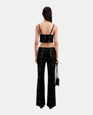 The Kooples FEMME BLACK pantalon flare en velours avec sequins noir