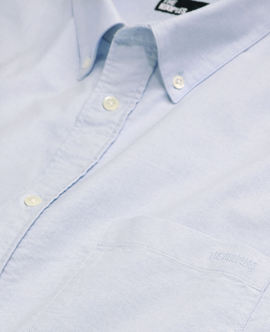 camisa azul de algodón