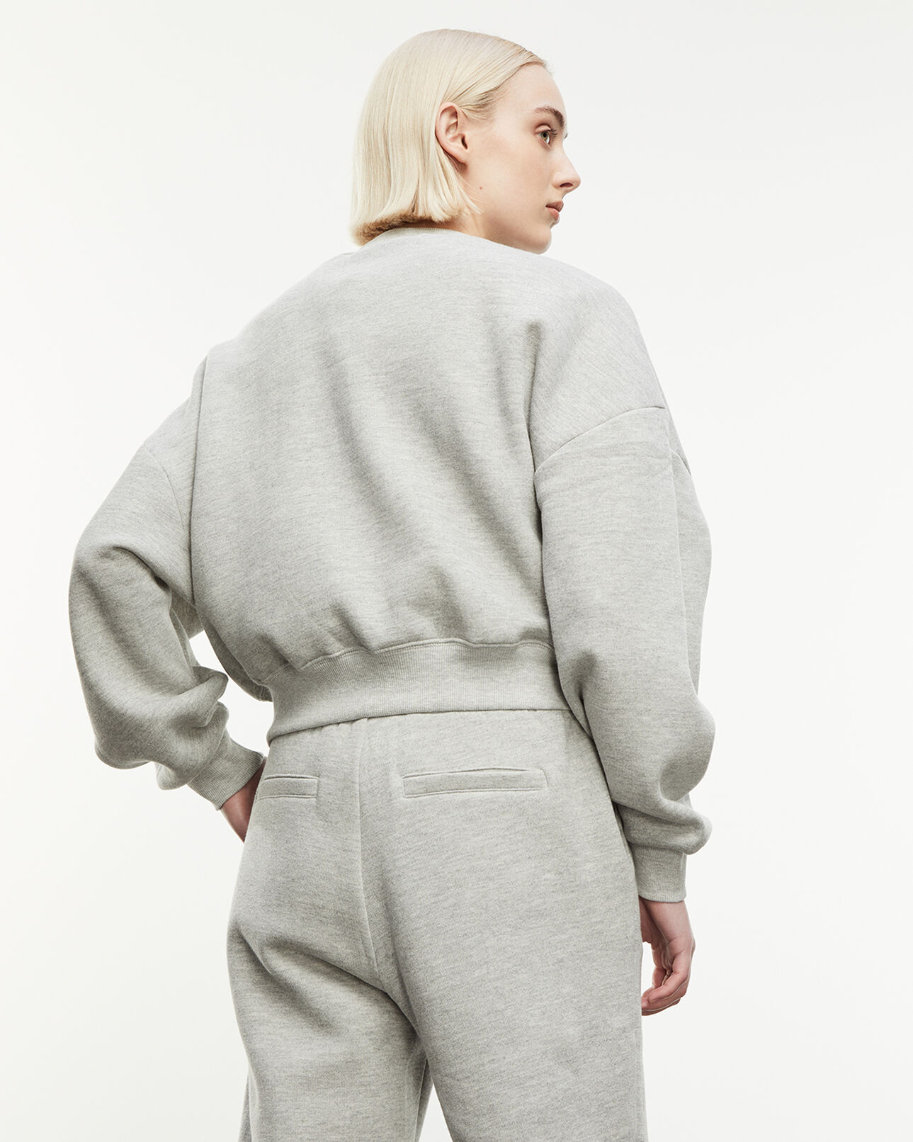 The Kooples FEMME LIGHT GREY MELANGE sweat gris à logo vague contrasté