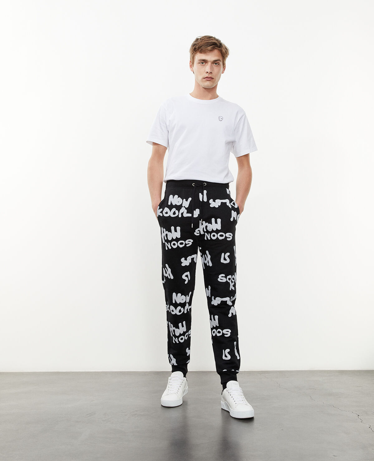 Champion all over print joggers black discount