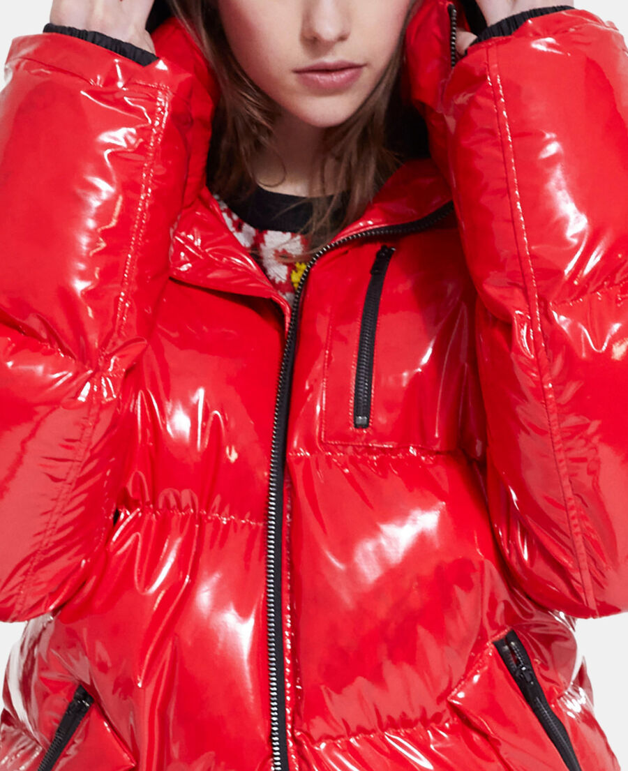 red oversized vinyl down jacket with straps and logo