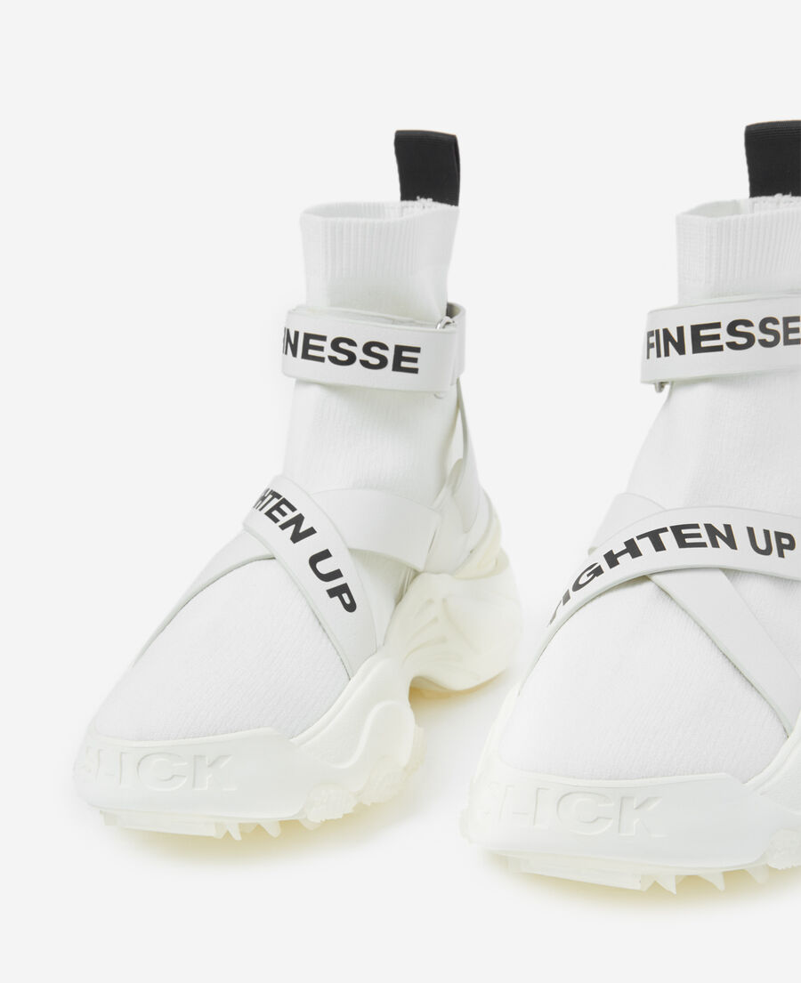 slick white high-top trainers with text