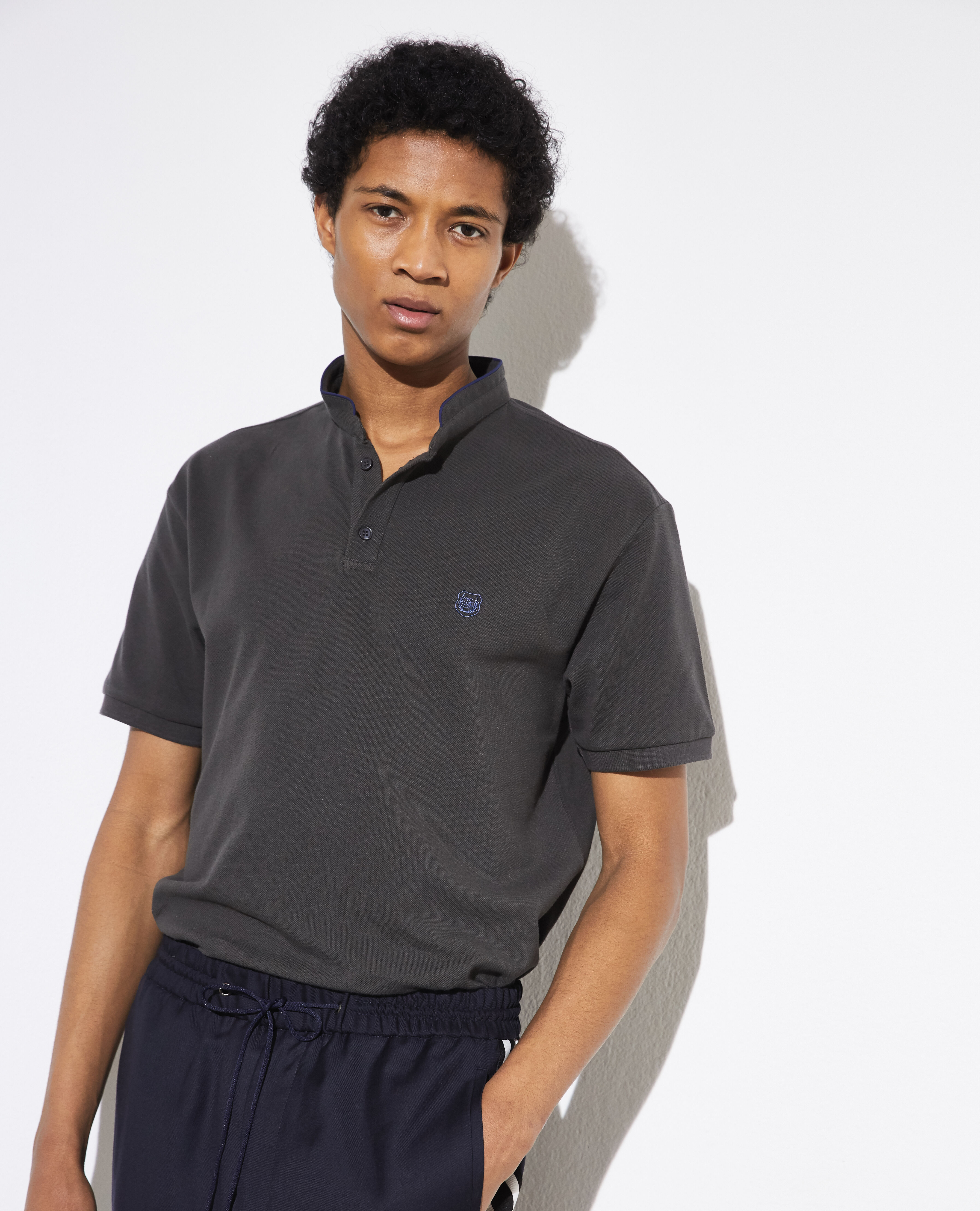 Khakis with top black polo