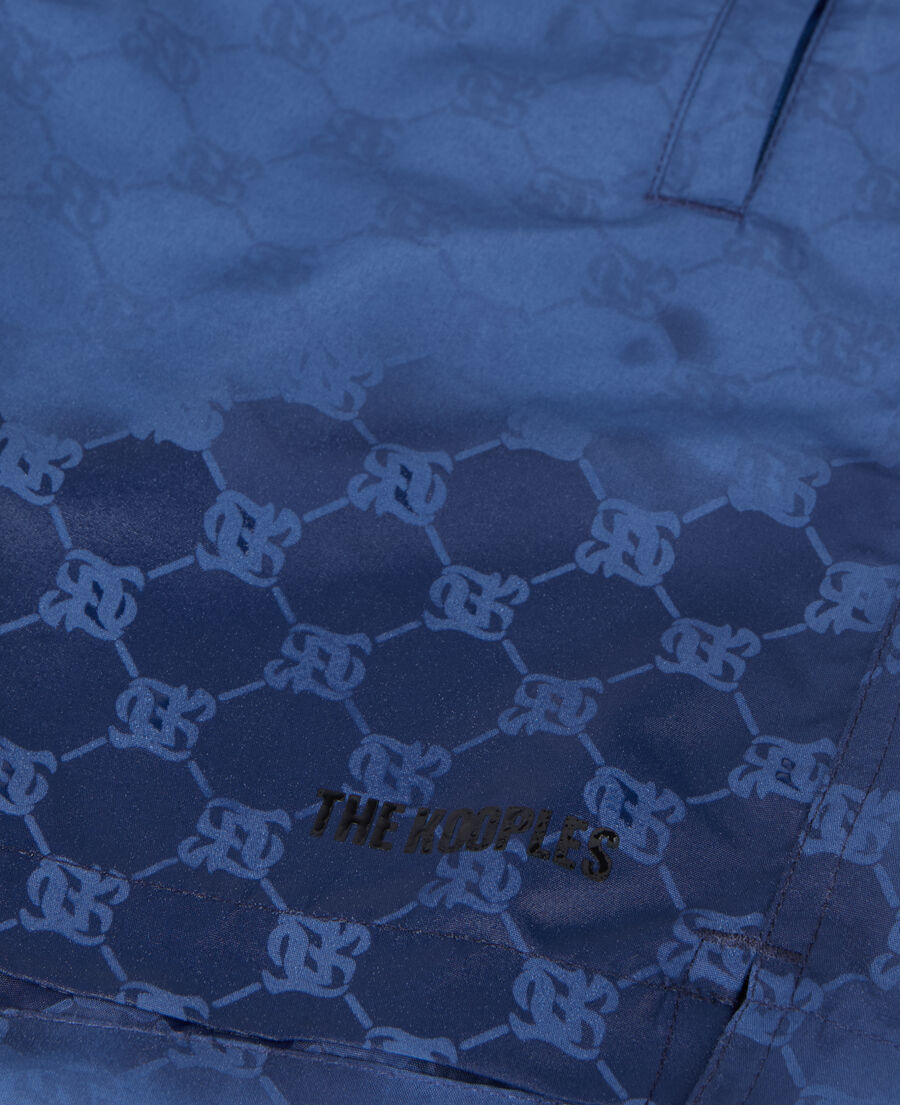 marineblaue badeshorts mit monogramm
