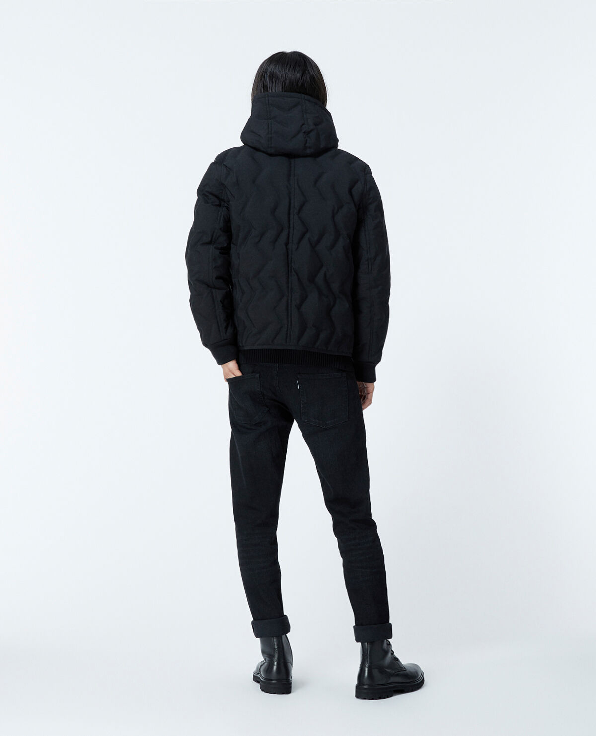 Black hooded down jacket with quilting