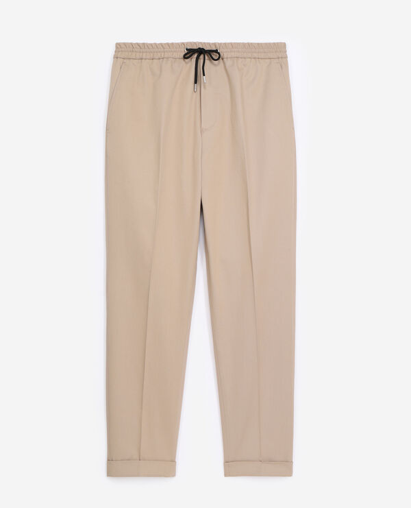 beige flowing low-waisted pants
