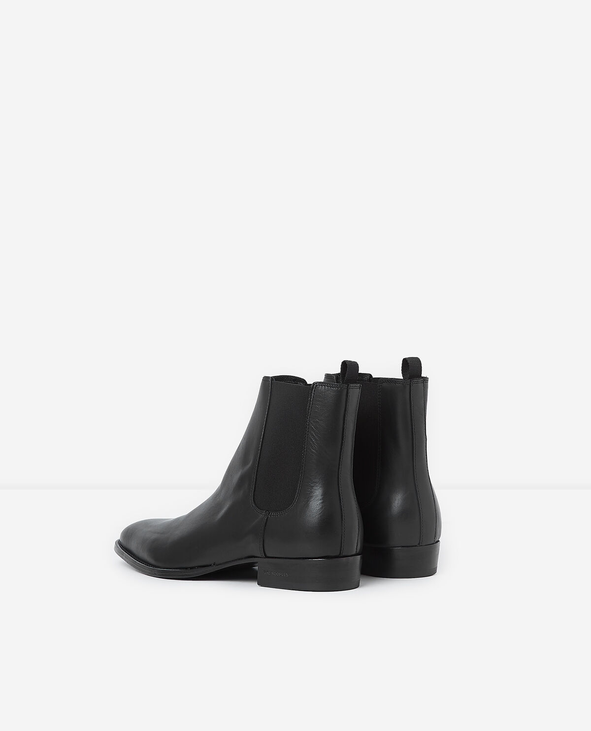 Flat black leather chelsea boots