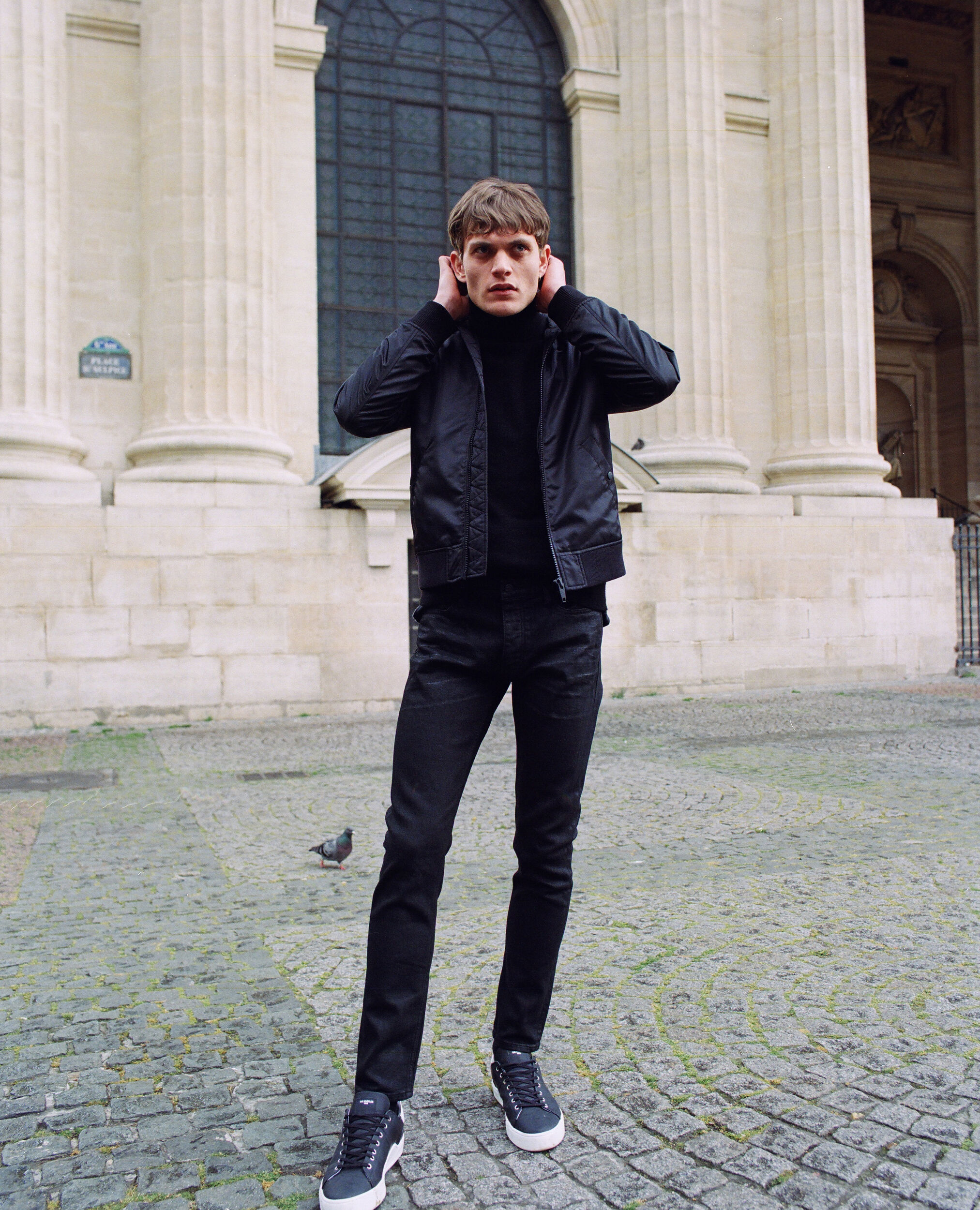 Black nylon jacket with fleece hood