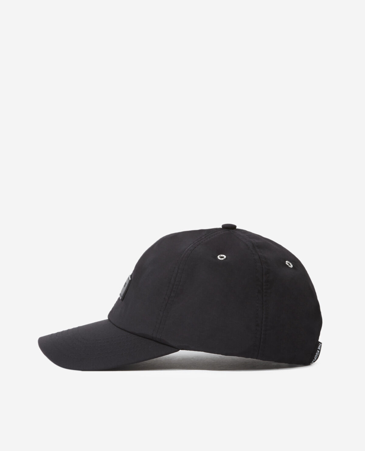 Black nylon cap with matching leather badge