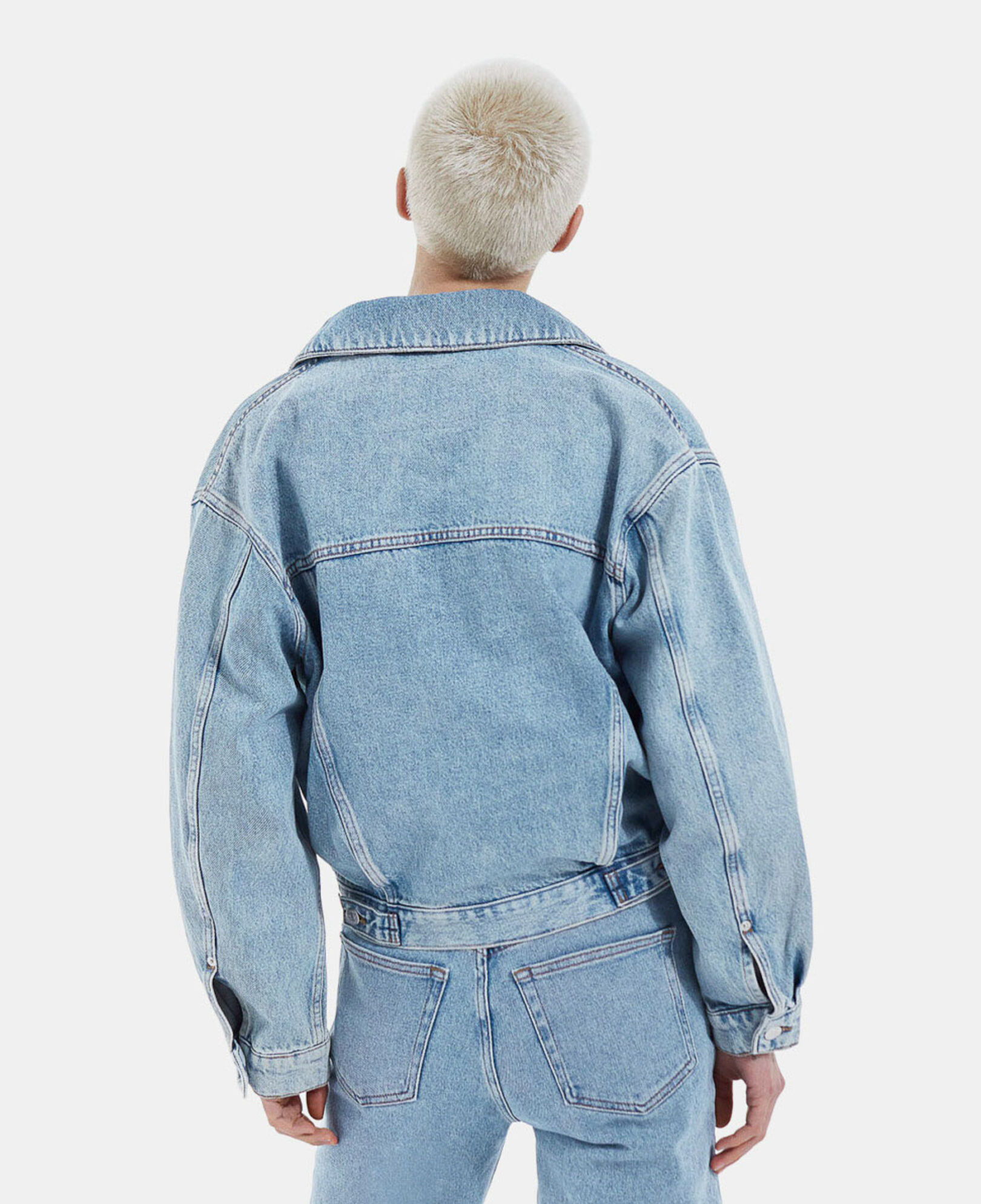 Blue faded jean jacket with chest pockets