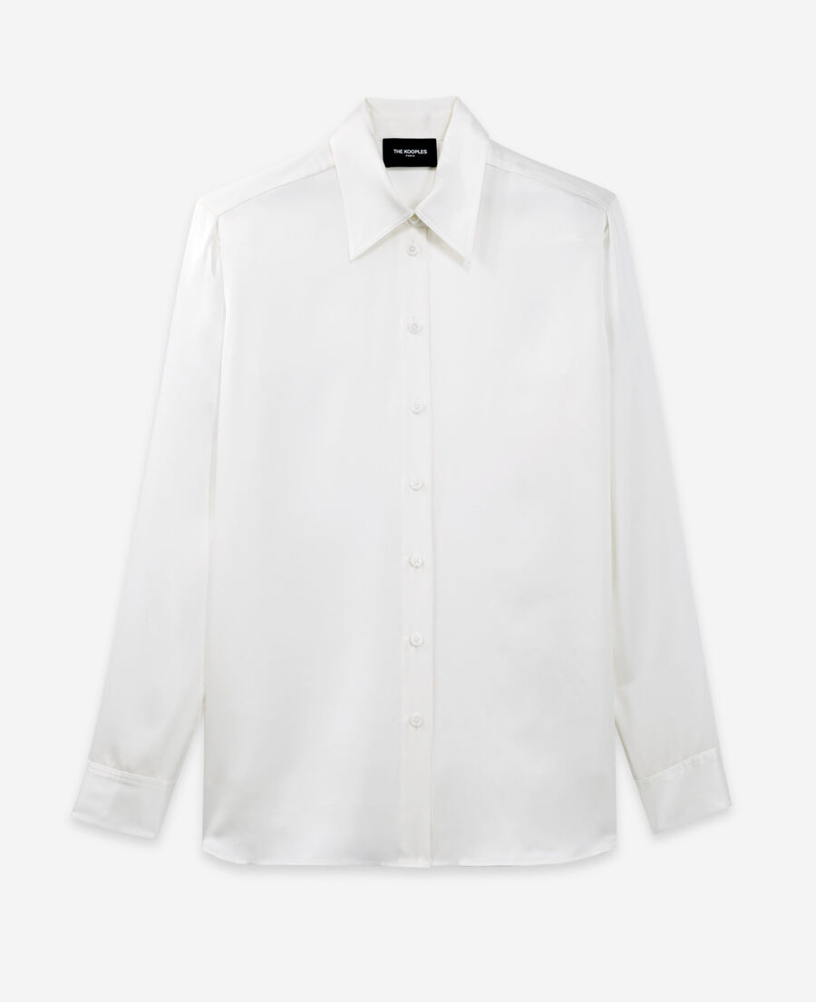 loose white shirt with large cuffs