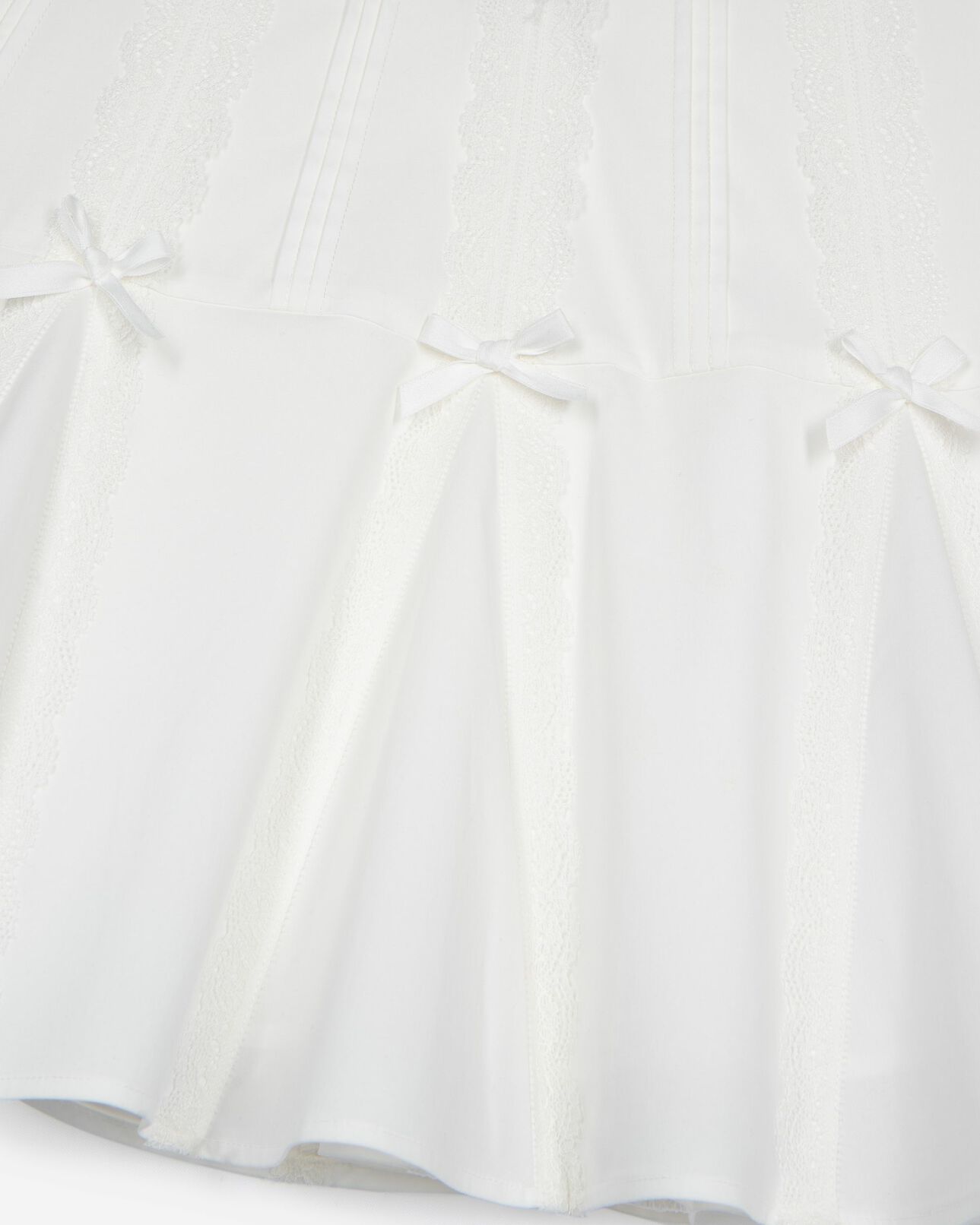 The Kooples WOMEN ECRU short skirt with bow detail in ecru