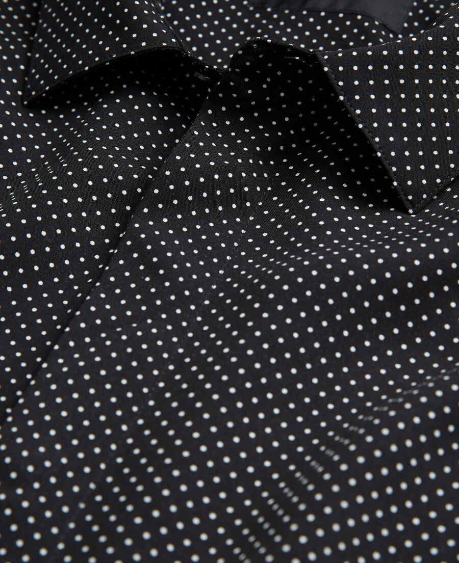black polka-dot shirt