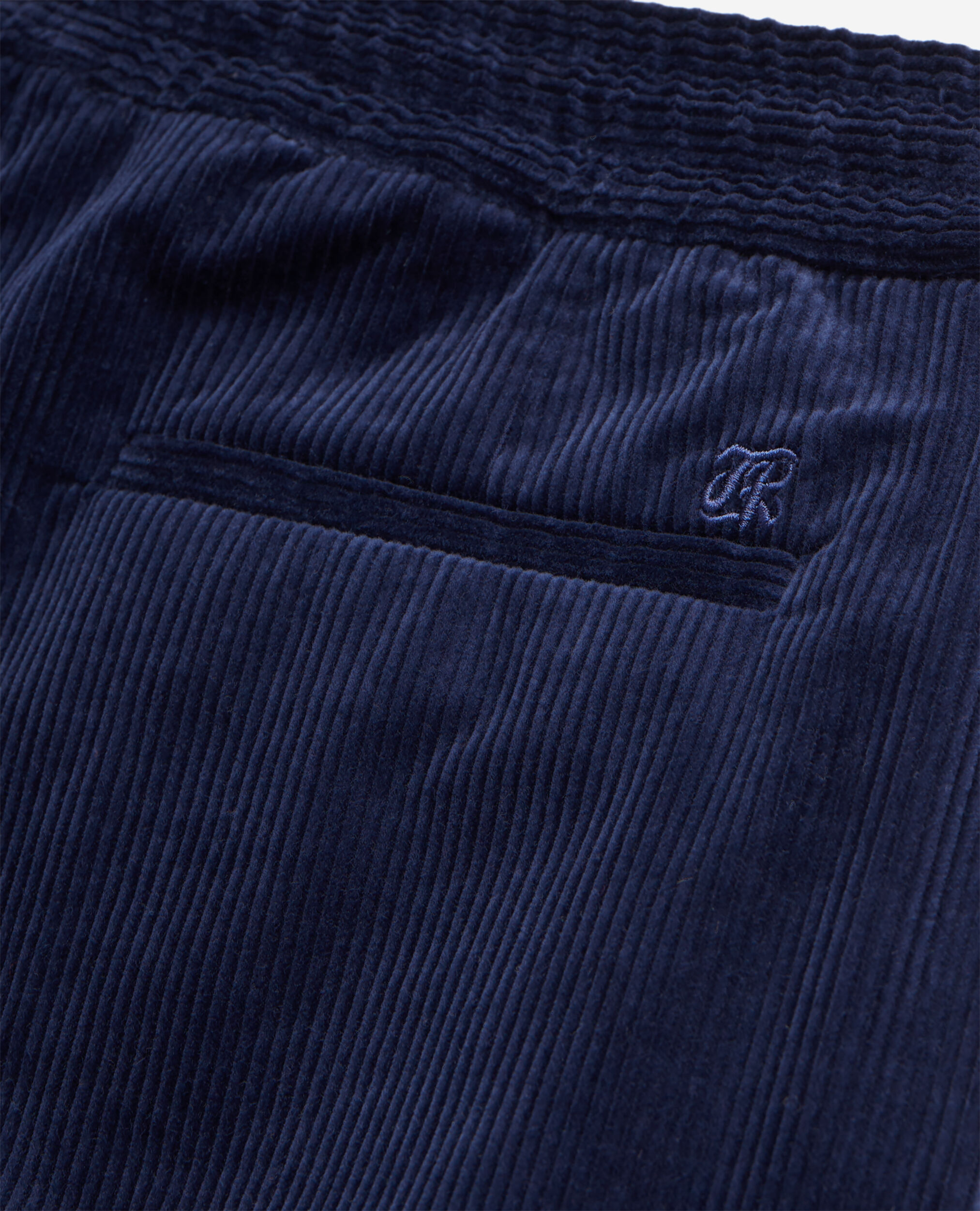 Navy blue corduroy trousers