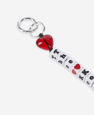 The Kooples F WHITE white and red beaded bag charm