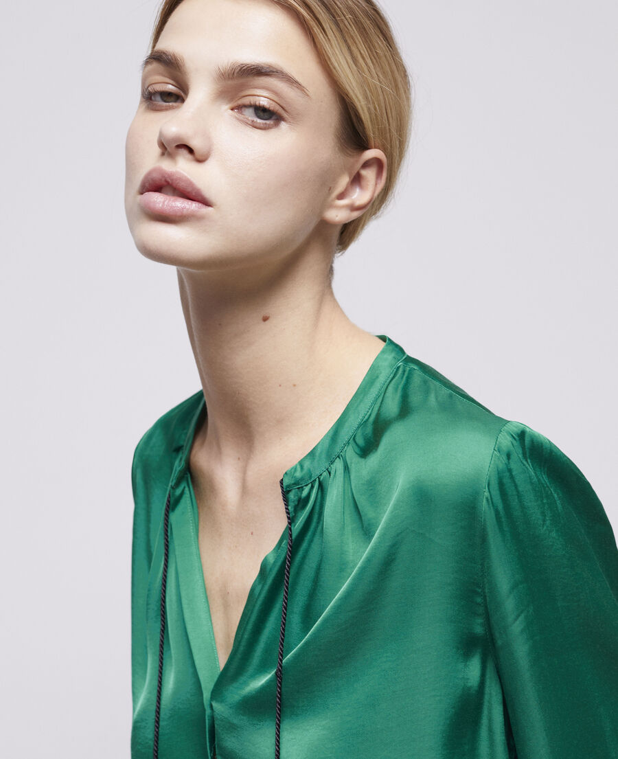 green shirt with puffed sleeves