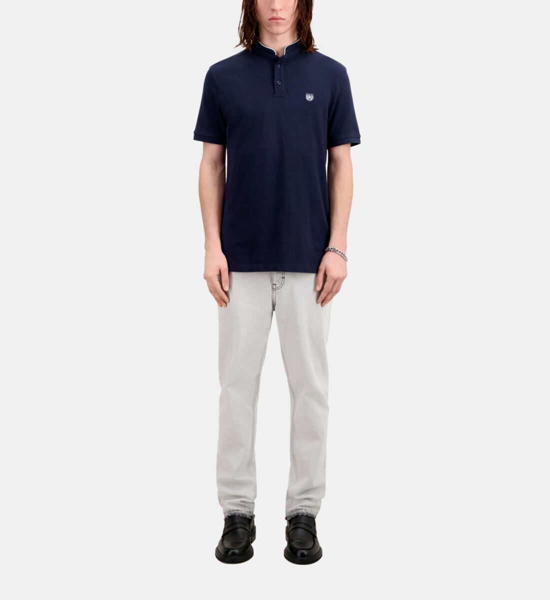 Navy blue polo shop shirt and khaki pants