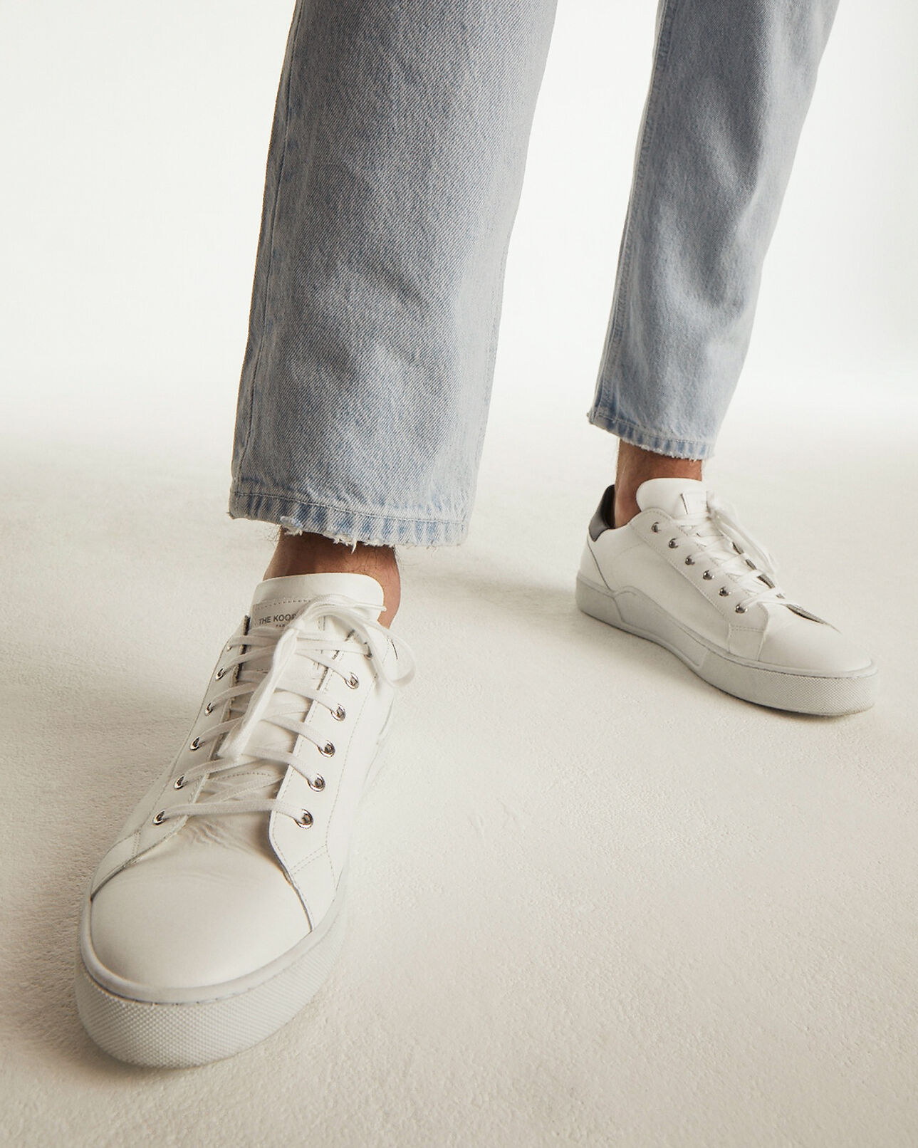 The Kooples MEN WHITE / BLUE white sneakers in leather with blue tongue