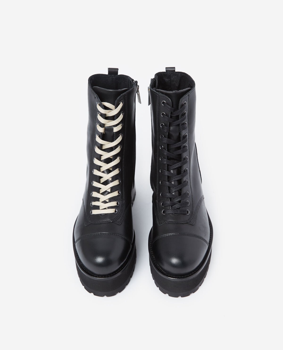 Black leather ankle boots with notched soles The Kooples