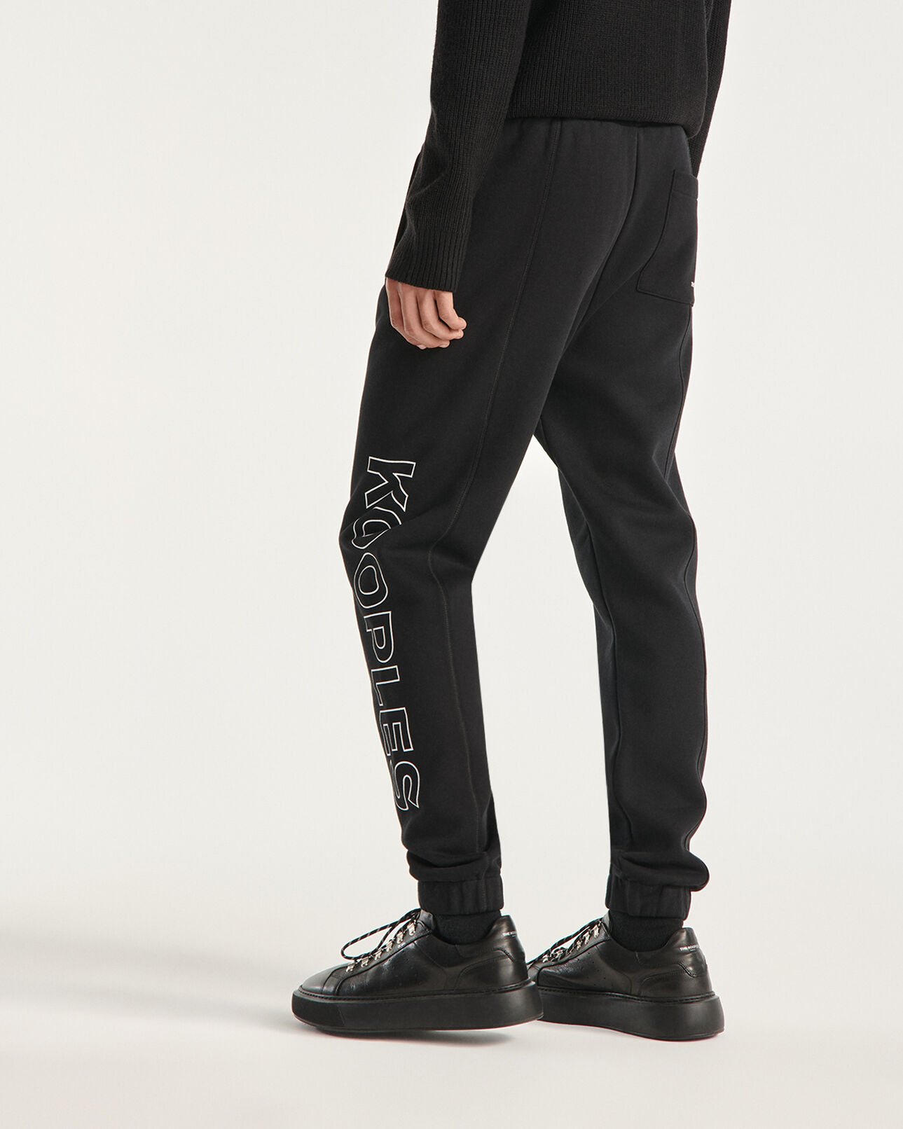 The Kooples HOMME BLACK jogging noir imprimé the kooples latéral