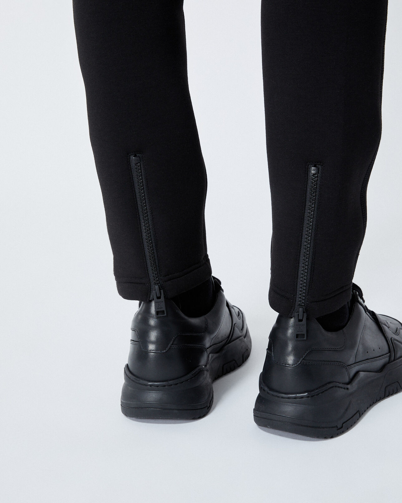The Kooples MEN BLACK zipped skinny black joggers with logo patch