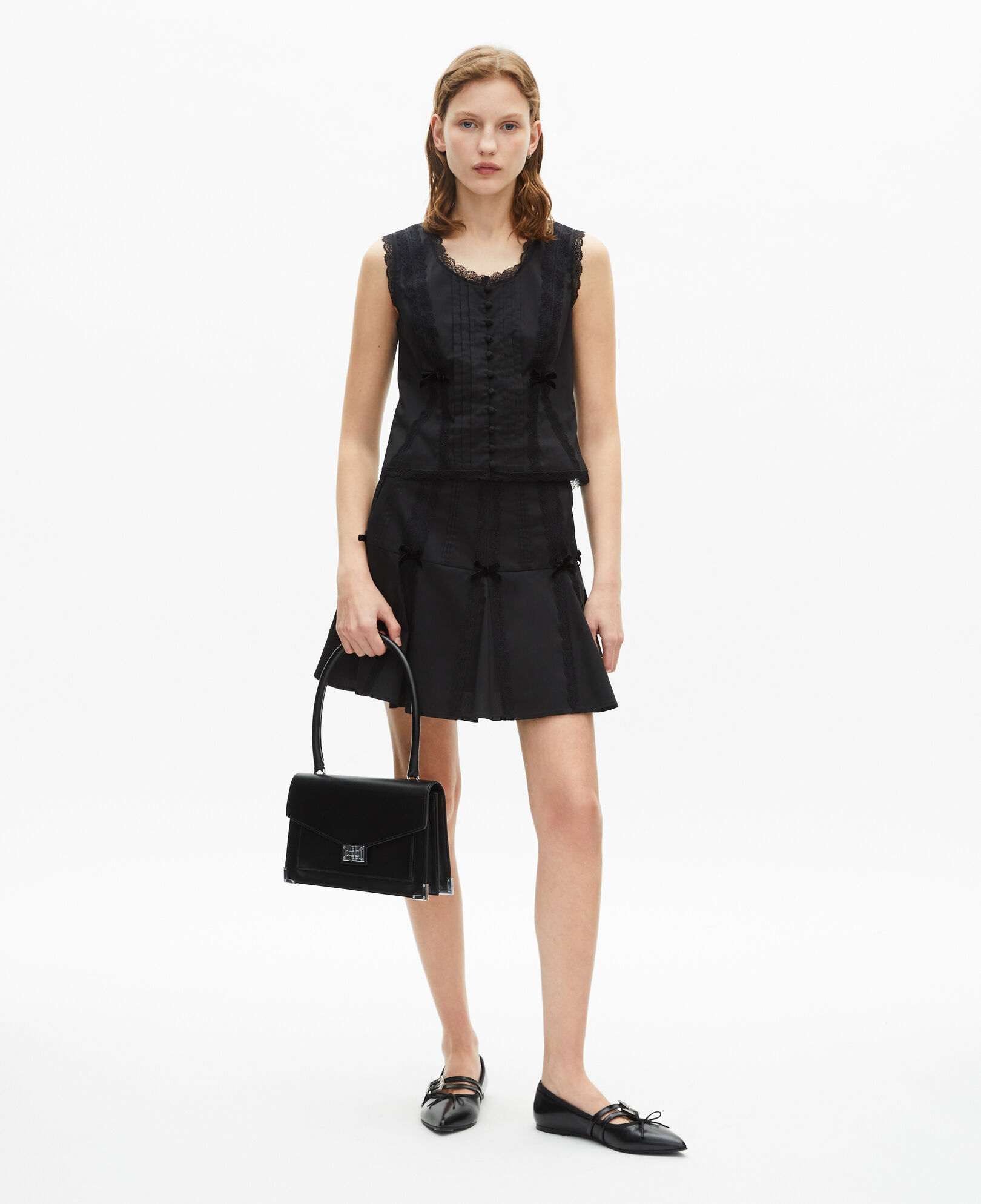 The Kooples DAMEN BLACK kurzer rock mit schleifendetails in schwarz