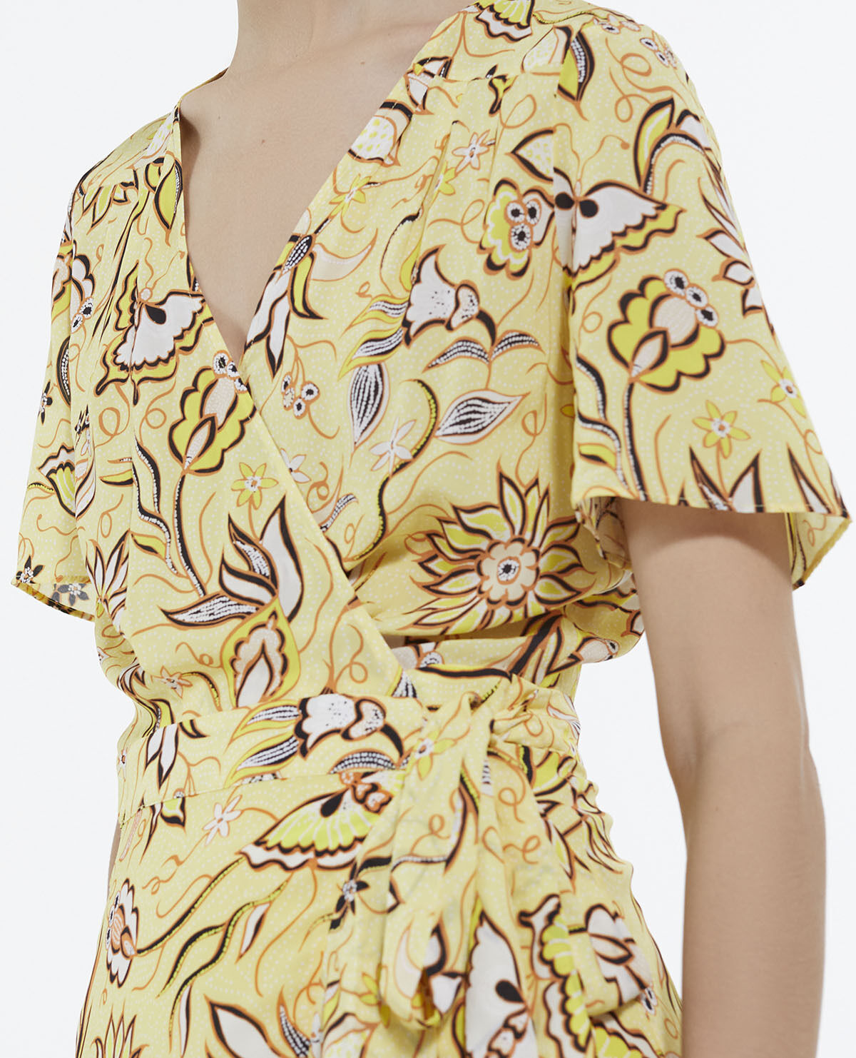 Long yellow wrap dress with floral motif