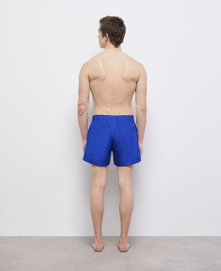 blaue badeshorts mit logo
