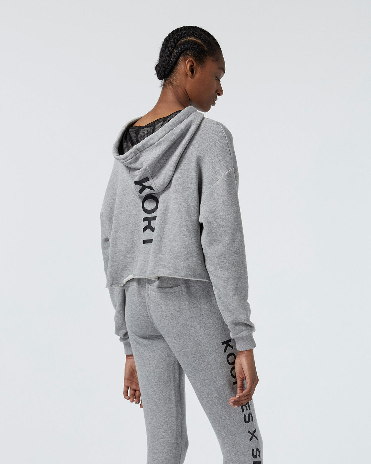 The Kooples FEMME LIGHT GREY MELANGE sweat gris clair à capuche et logo