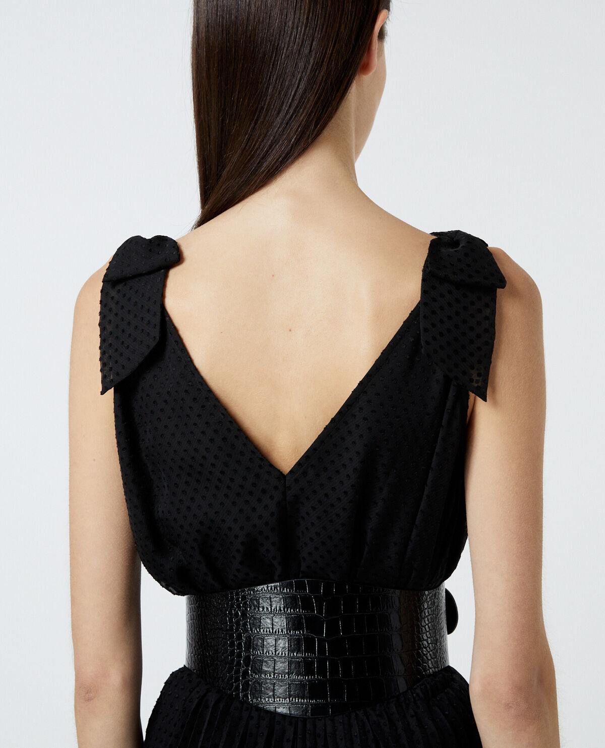 Black dress with silver outlet belt