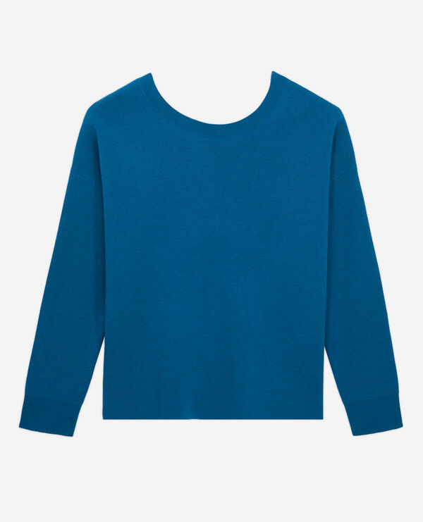blue sweater with buttoning on the back