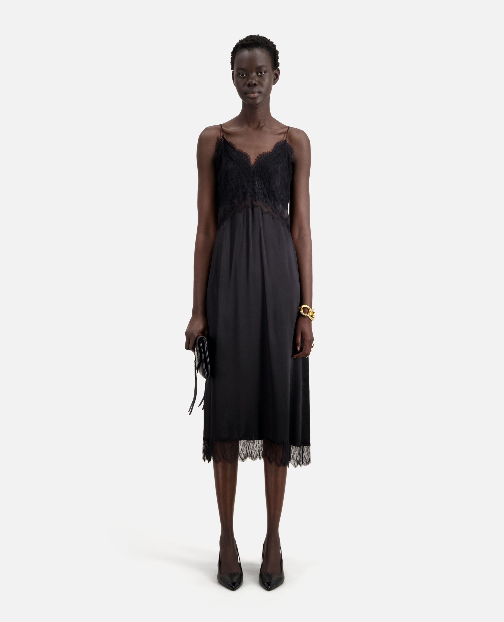 Long black silk slip dress with lace details