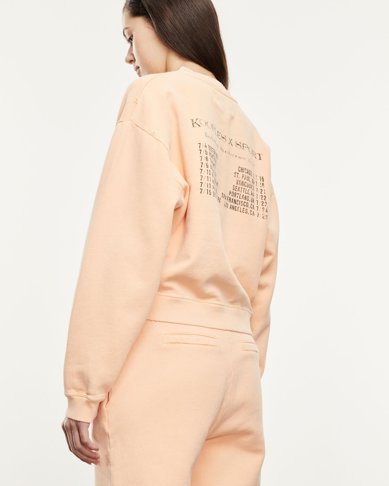 The Kooples FEMME OLD ORANGE sweat orange délavé à détail piercing