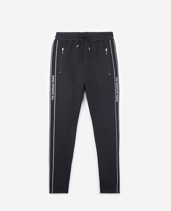 The Kooples HOMME NAVY bas de jogging skinny bleu marine avec bande rouge et logo et zip